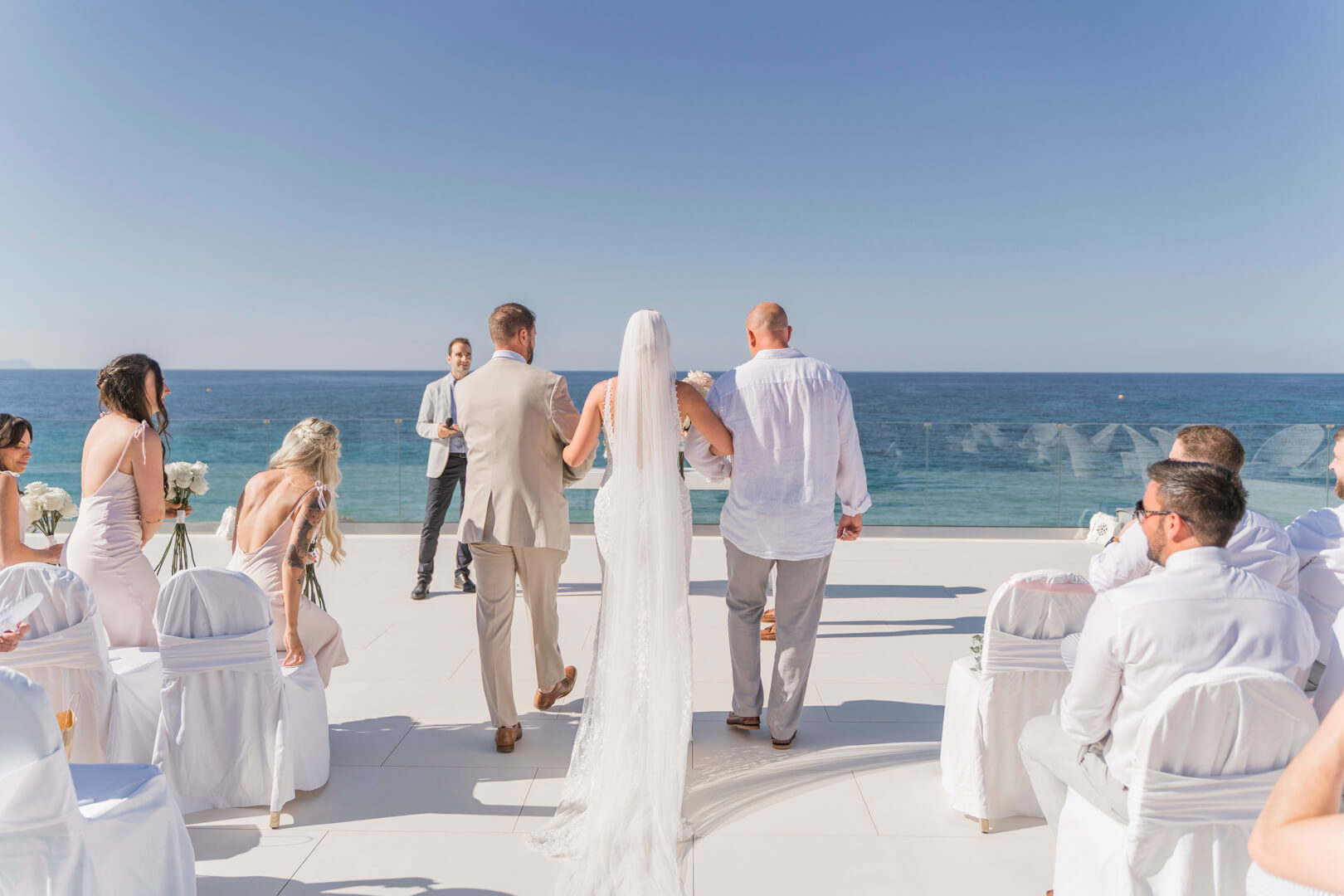 Ceremony in Luxme White Palace wedding venue with sea view